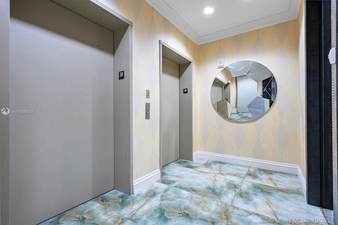 elevator foyer with onyx floors