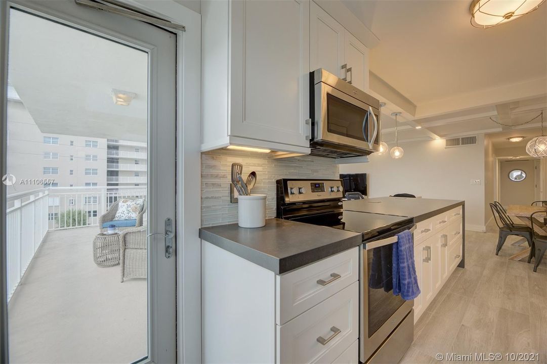 PATIO ACCESS FROM THE KITCHEN OR LIVING ROOM