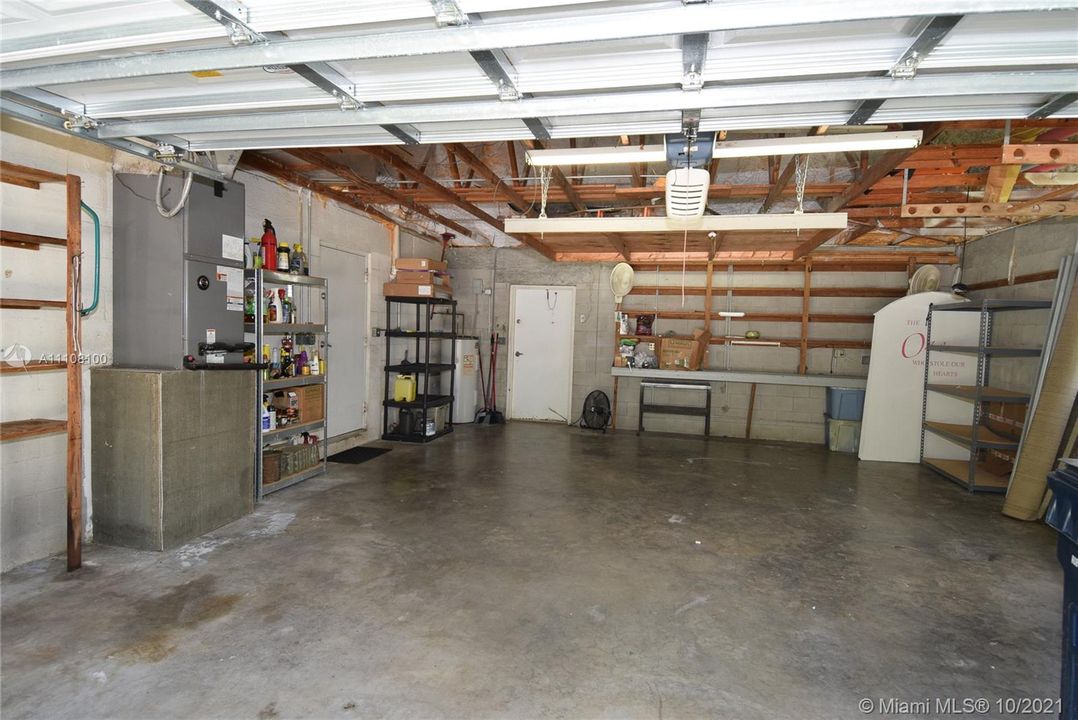 attached 2 car garage with auto opener