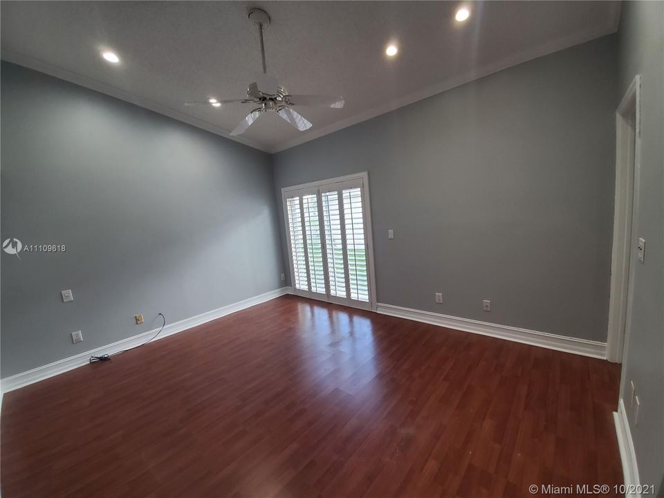 Master bedroom with high ceilings and new LED lighting