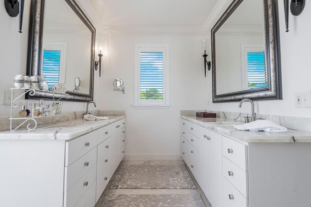 Individual vanities with under lit Onyx counters