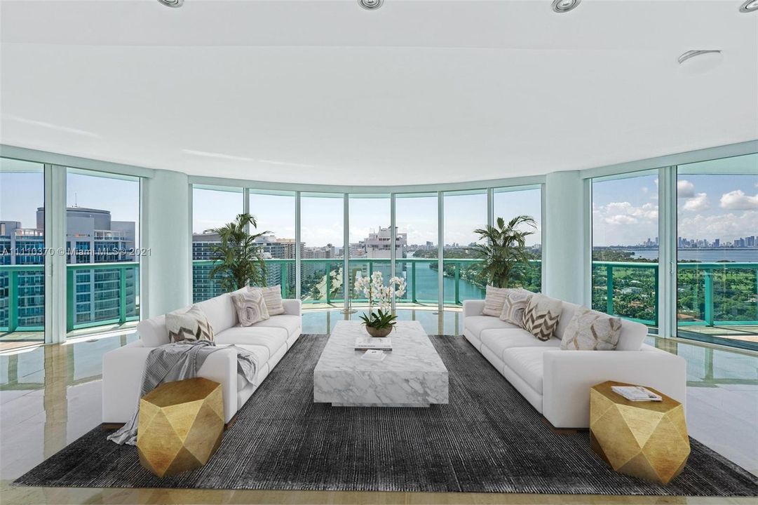 Living room with stunning views of the ocean, South Beach and downtown Miami