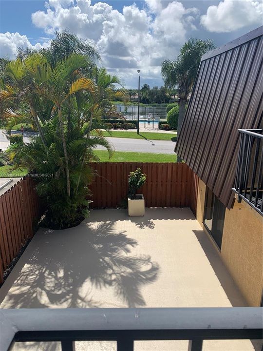 2ND Floor Guest Bedroom view of Courtyard and Community Pool