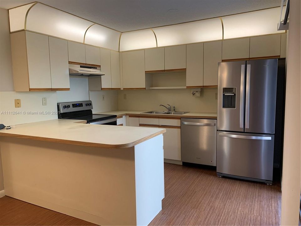 Kitchen w/Brand New Whirlpool Appliances and new sink fixture