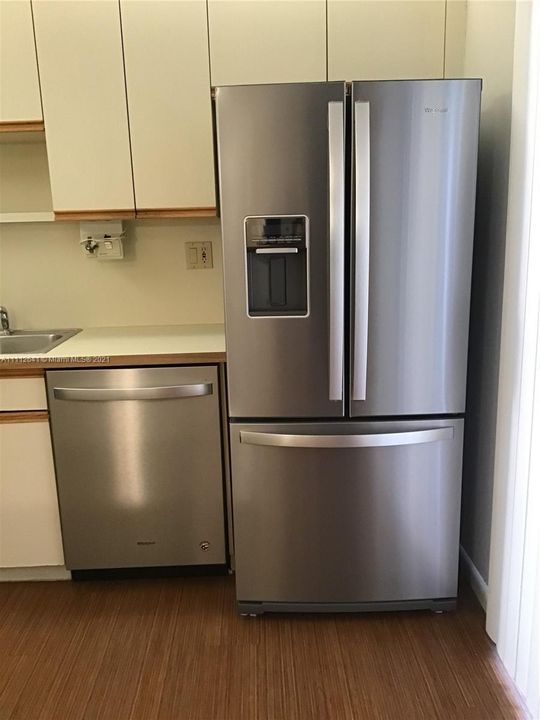 New SS Whirlpool refrigerator and SS dishwasher