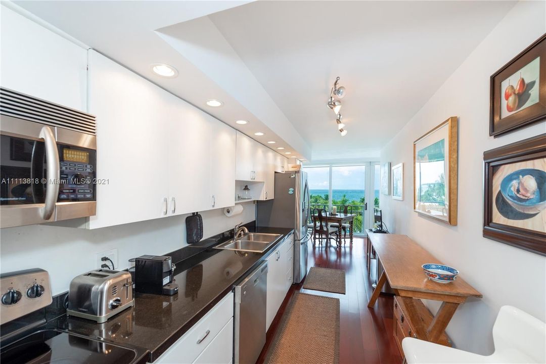 KITCHEN WITH OCEAN VIEWS & STAINLESS STEEL APPLIANCES - STUNNING CONDITIONS