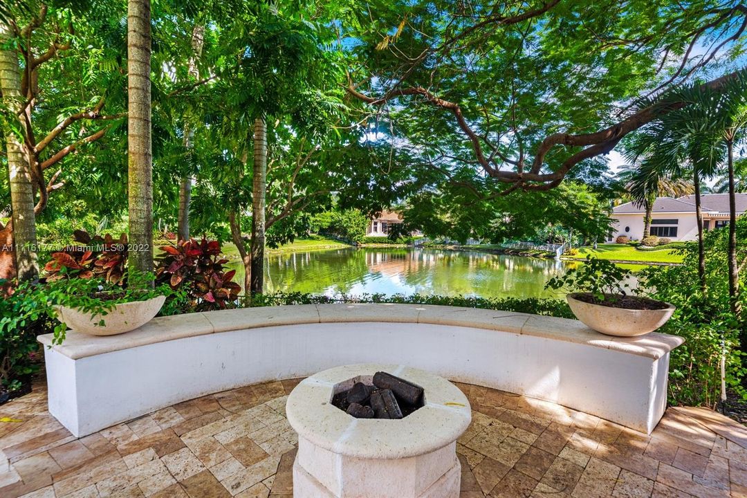 Roast Marshmallows or just enjoy the views with the bench seating under the lanai by the lake.