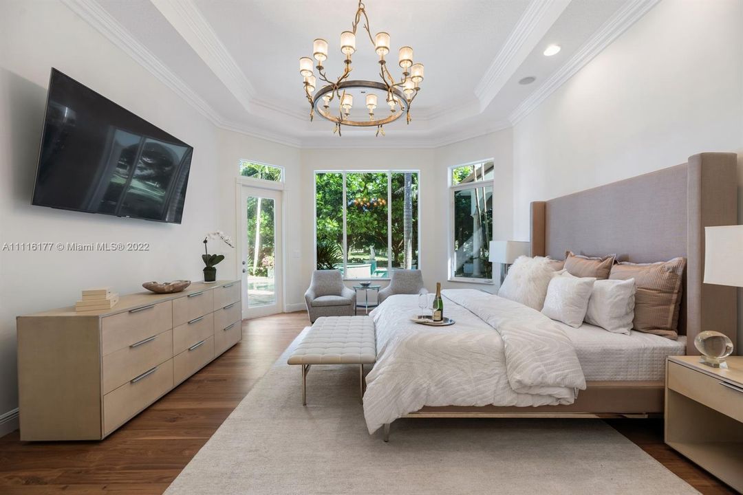 Primary Suite with beautiful views and French Door opening out to the outdoor space