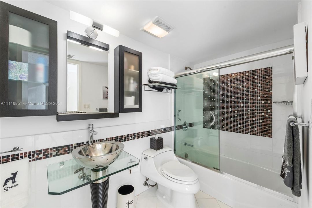 Separate renovated bathroom with beautiful deco design.