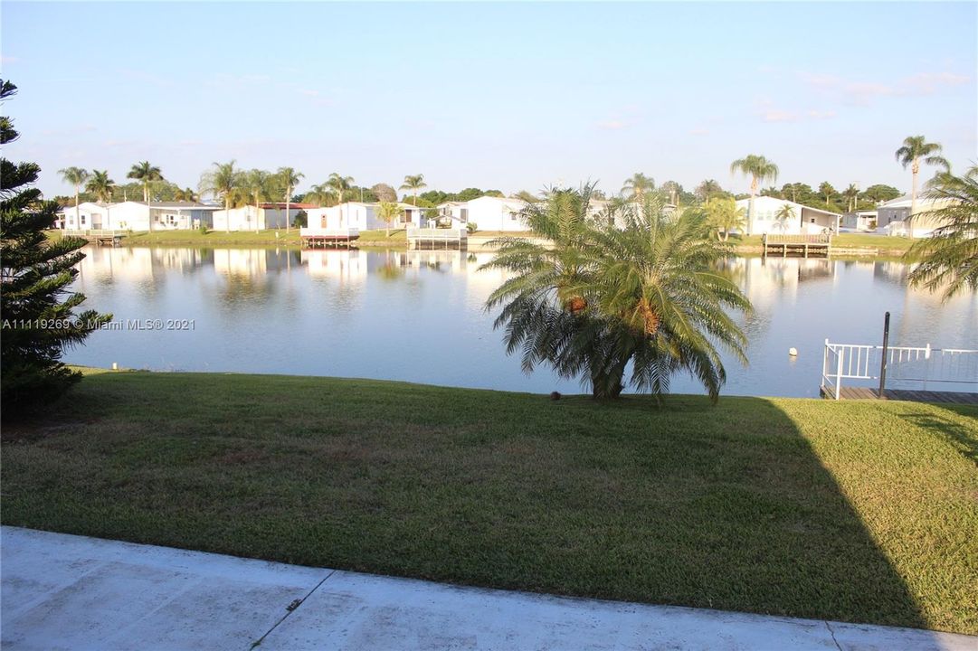 Lake view at Oasis Village behind property