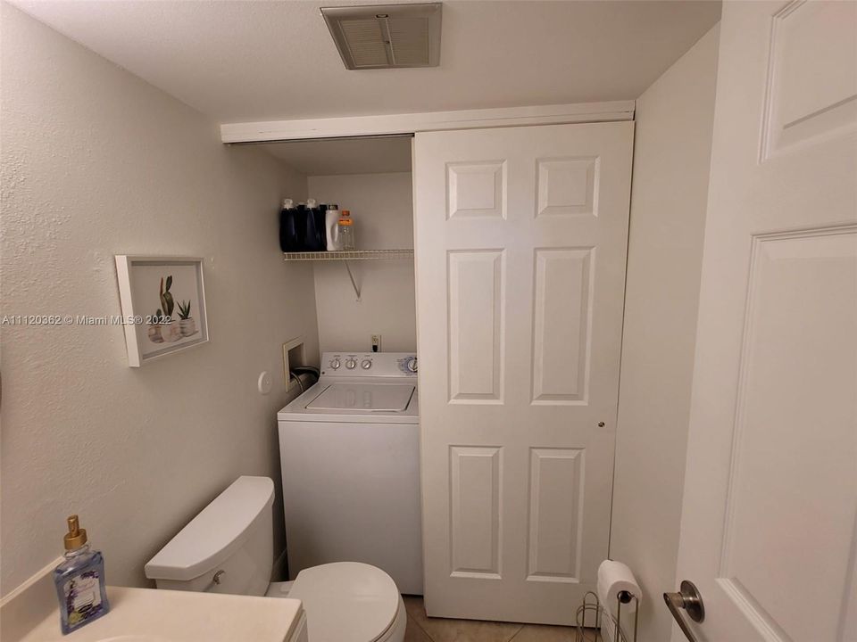 Half Bath with washer and dryer