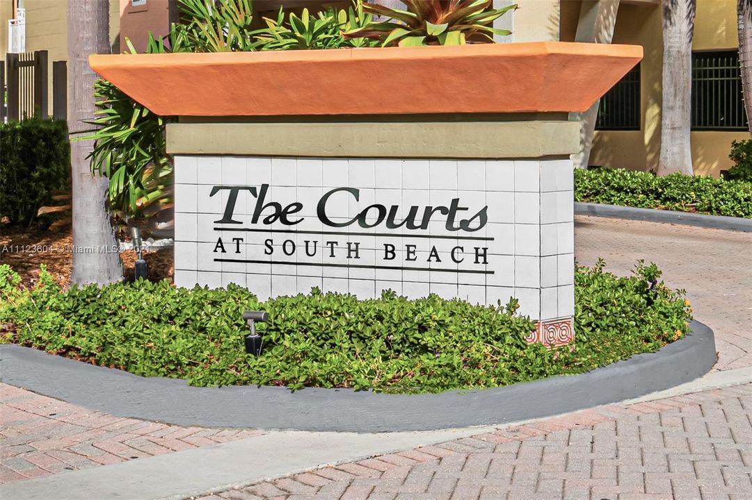 The Courts Signage.