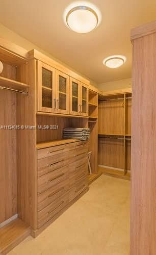 Owner's Suite: Custom Walk-in closet #1