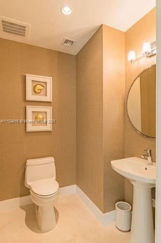 Powder Room with designer selected wall coverings