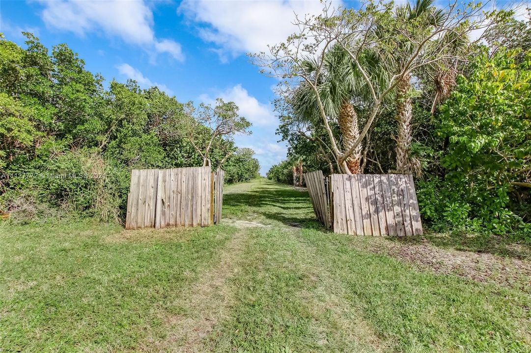 Entrance to Bay Tree Island.  Gates soon to be replaced.