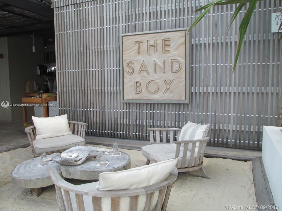 The Sand Box is a poolside restaurant in your back yard.