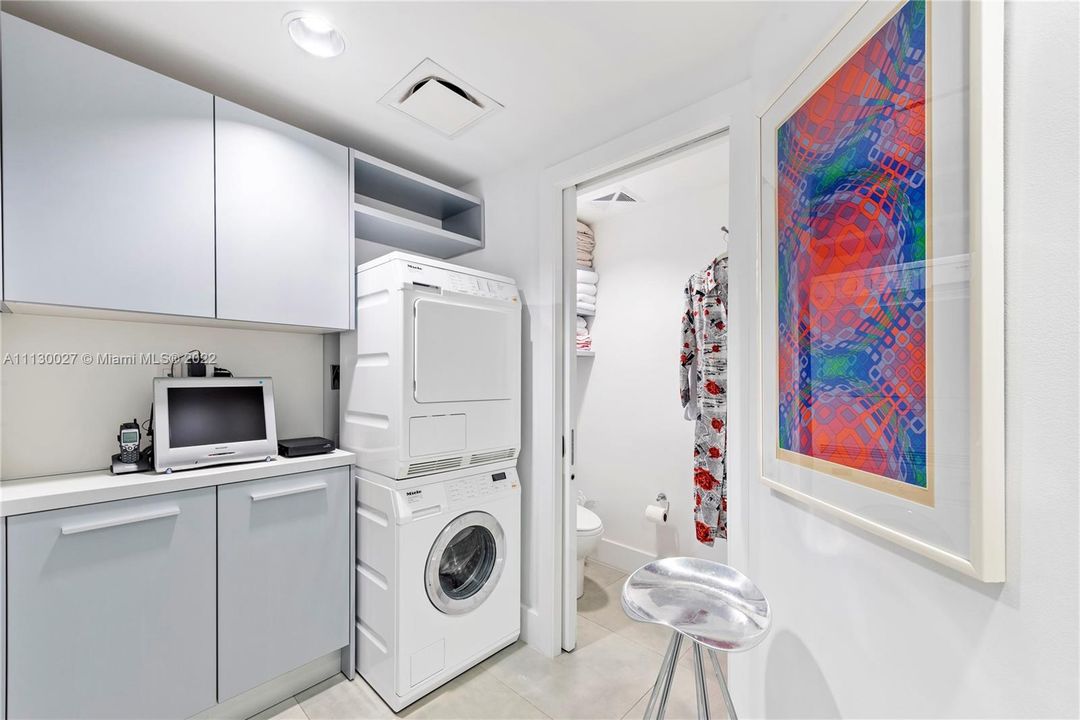 LAUNDRY ROOM WITH TOILET