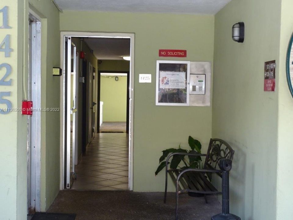 BUILDING ENTRANCE TO THE TWO ELEVATORS