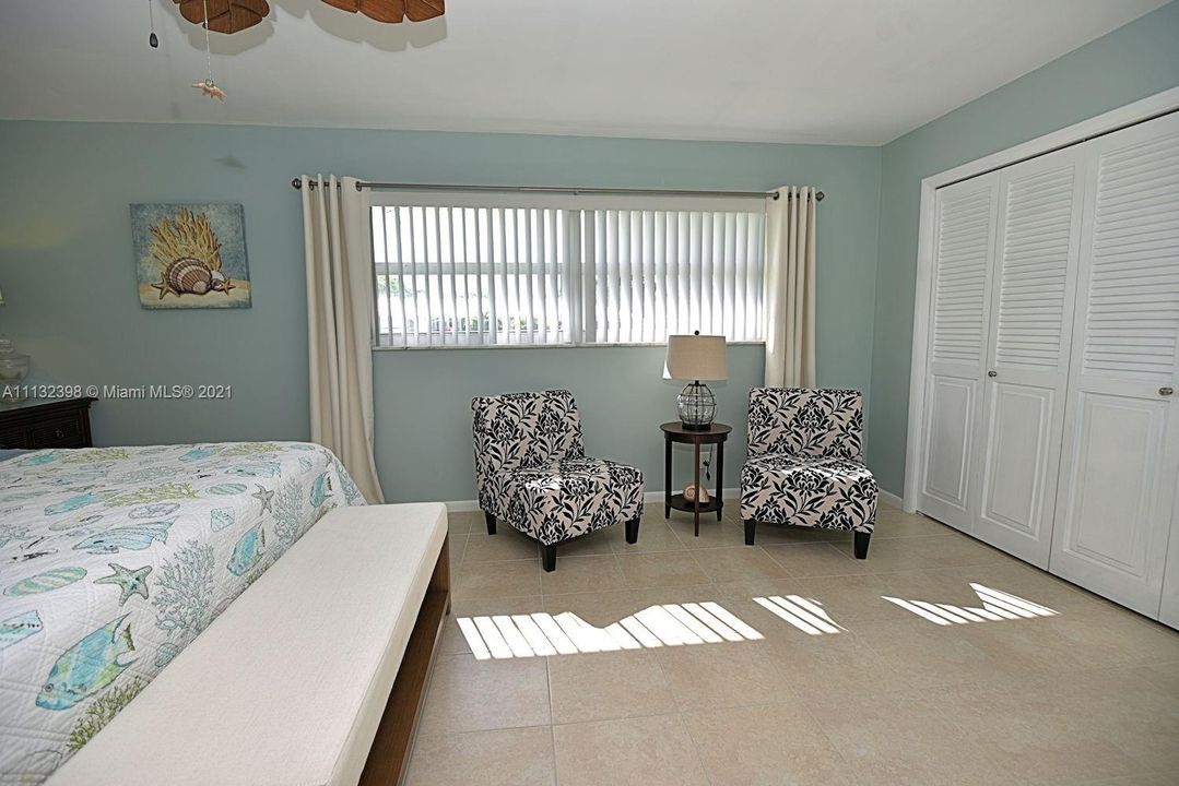 Nice sitting area with walk in closet in Master Bedroom