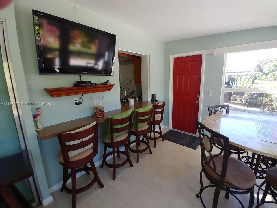 Florida Room . More dining entertainment overlooking beautiful backyard