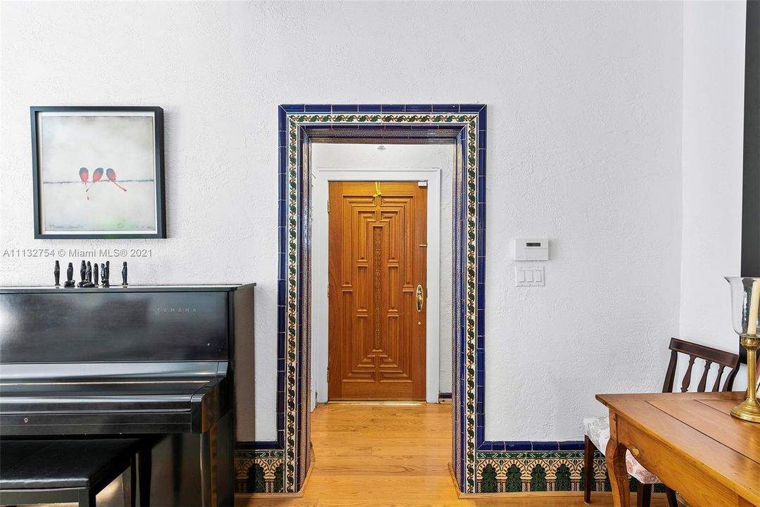 Inside find gleaming oak wood floors, & original Spanish tiled arched doorways & trims.