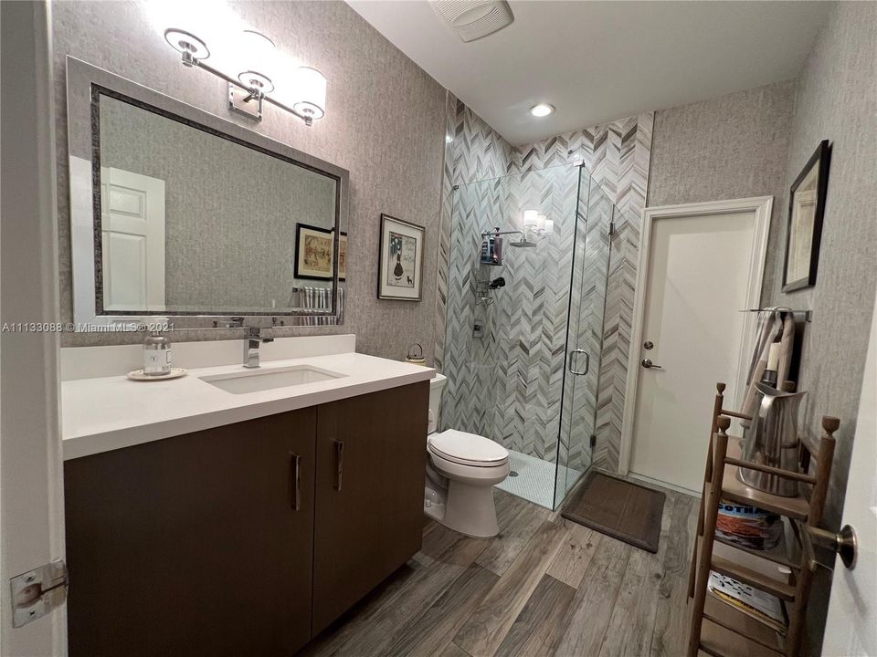 Bathroom completely renovated, new tiles, new vanity.
