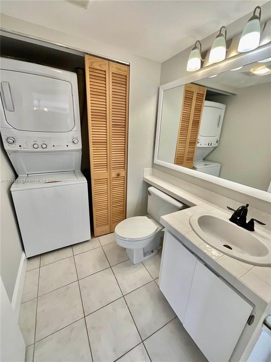 HALF BATHROOM / WASHER AND DRYER / ELECTRIC WATER HEATER