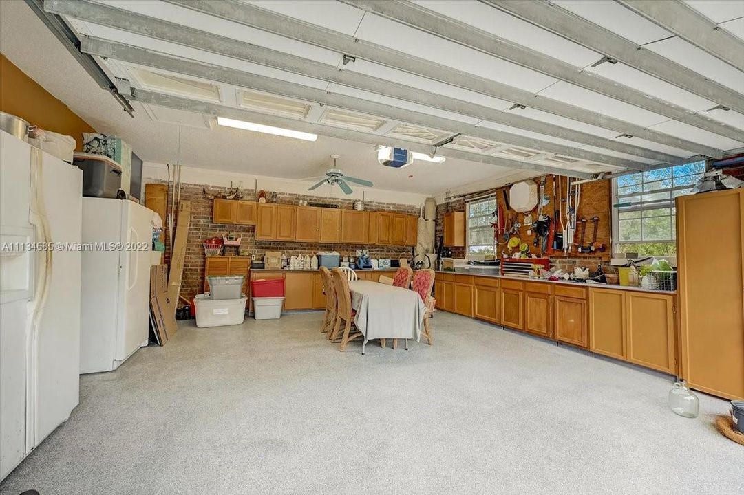 2 Car Attached Garage with Fridges & Cabinets