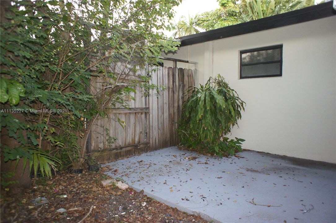 W/D through gate to utility room on right