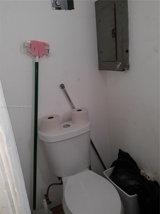 NEWER TOILET WITH WATER SAVER 3/4 BATH FEATURE. NEWER CIRCUIT BREAKER BOX