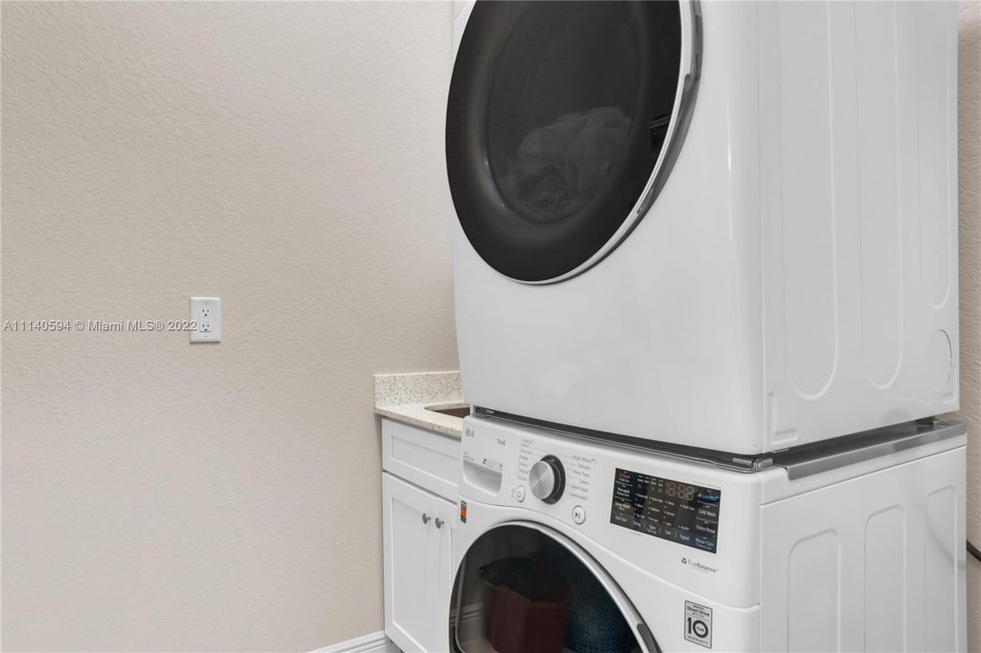 Laundry room -  Washer and Dryer, Cabinets and small sink