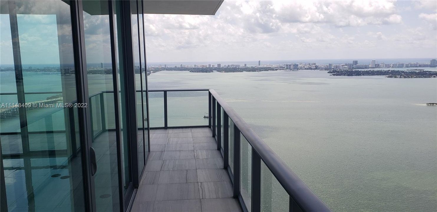 Oversized balconies facing the city and Biscayne