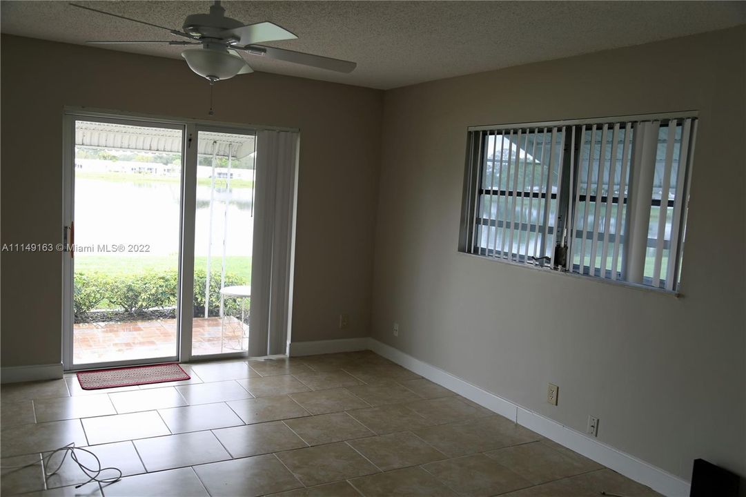 Hurricane sliders to lake from master bedroom