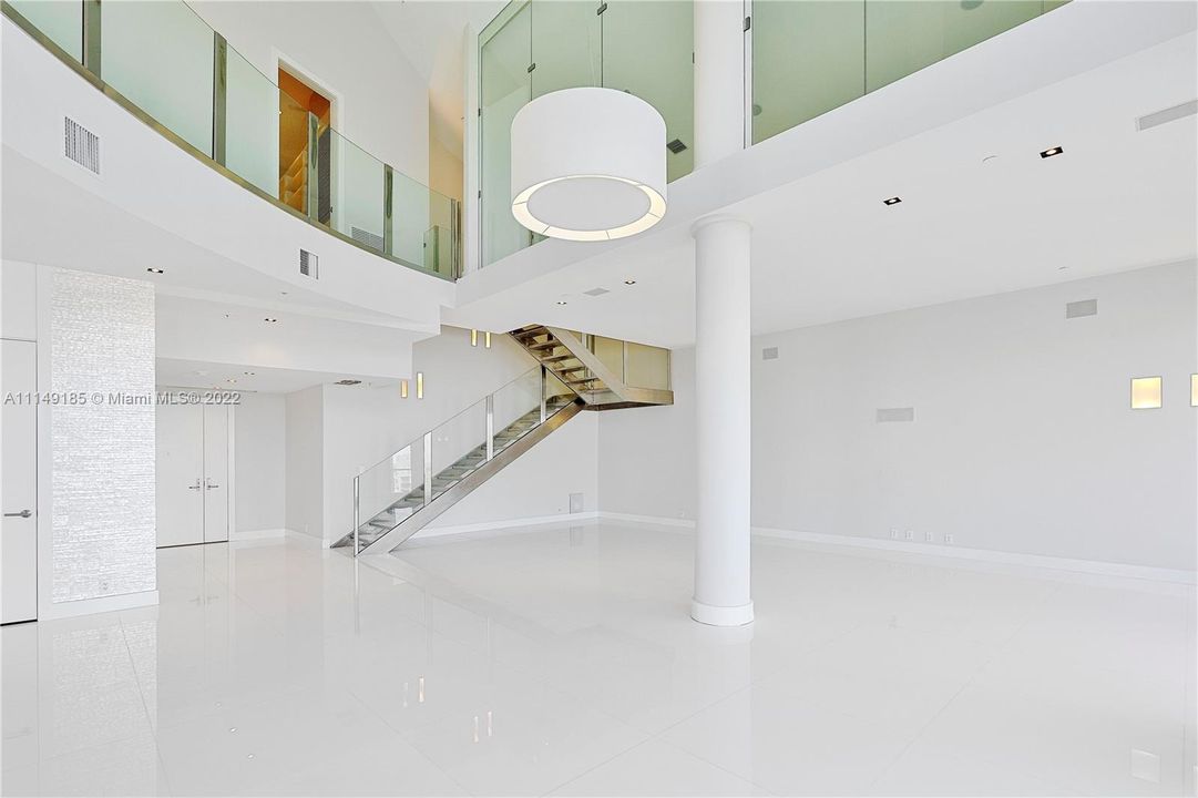Your stainless steel and glass stairway to an expansive 2nd floor.