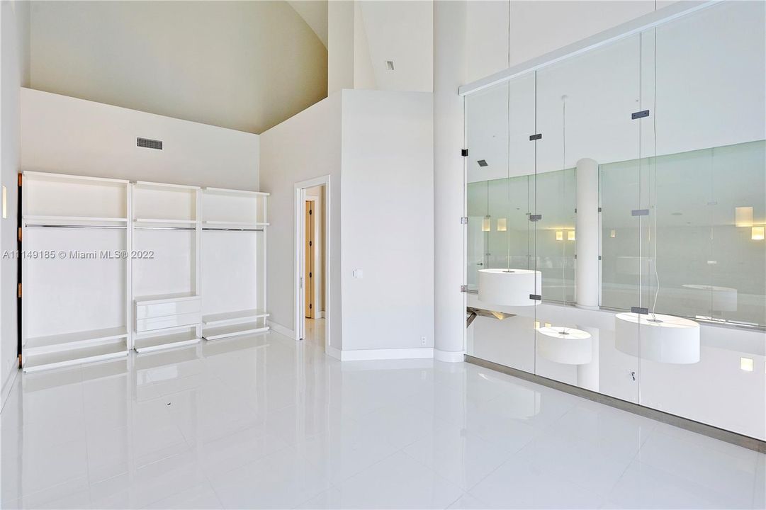 One of two large bedrooms on the second floor with stunning views and a built-in closet area.