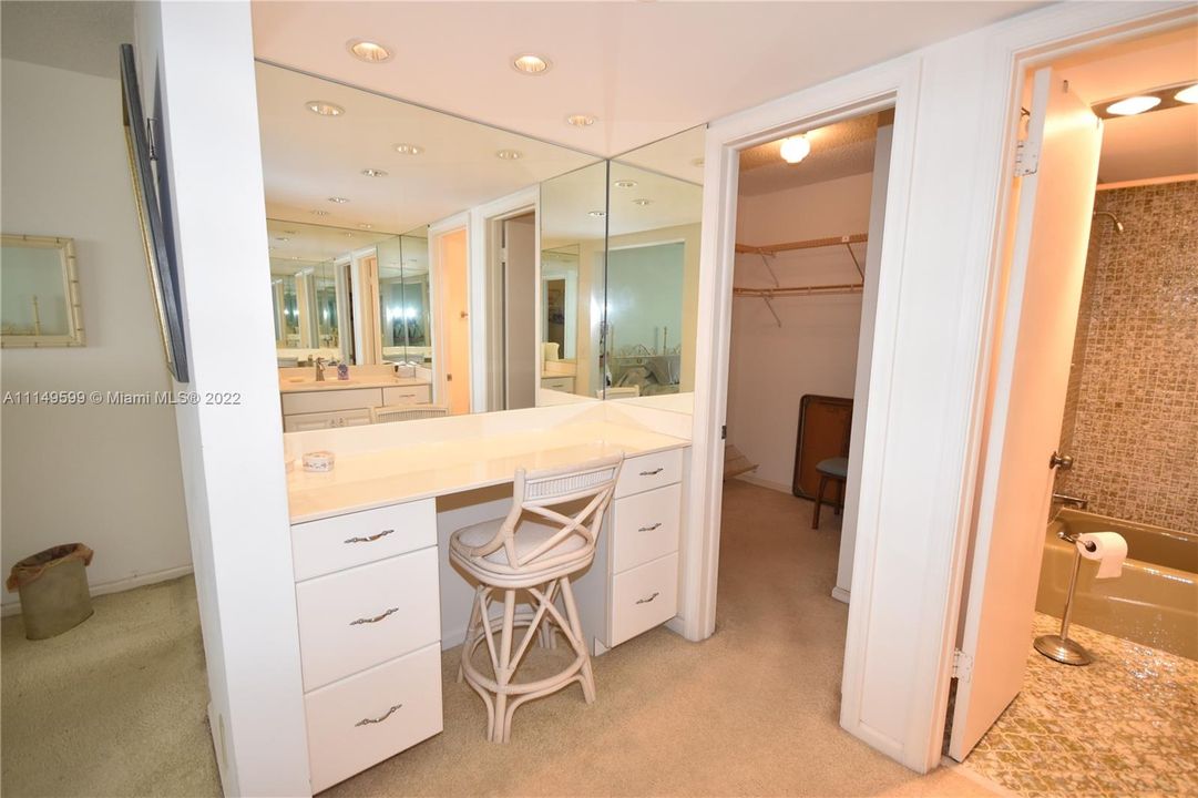 Dressing area Vanity on other with walk in closet