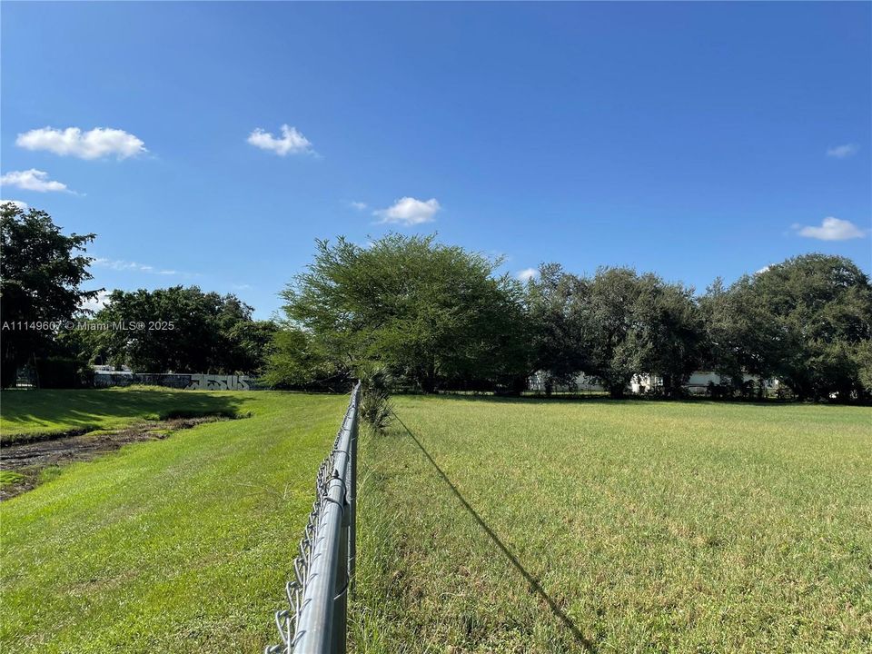 Looking South towards TAFT ST.  The left side of the fence is the SFWMD easement