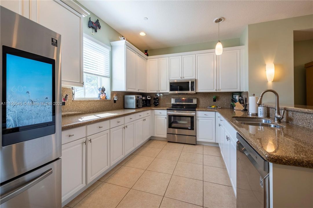 Kitchen full on view top of the line Refrigerator