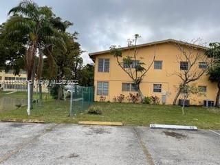 Lateral view of Condo and guest parking