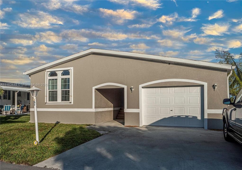 Front of home with covered entrance