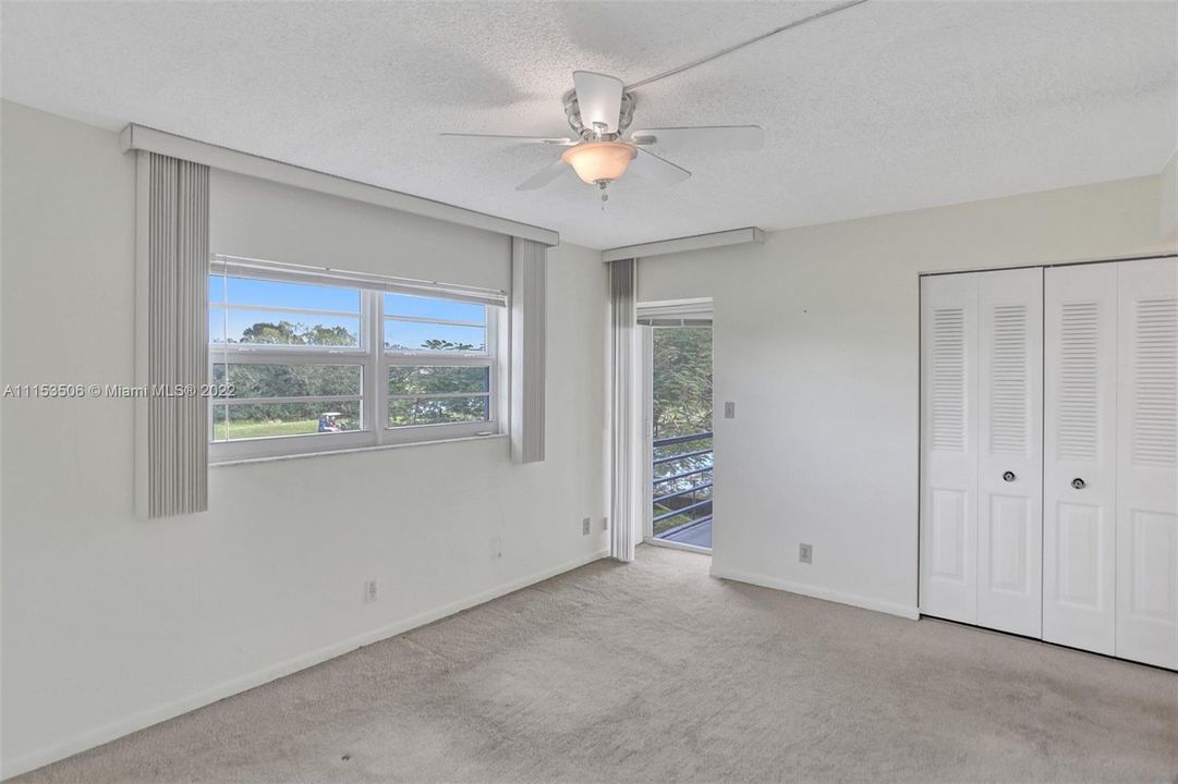 Main bedroom with access to screened balcony