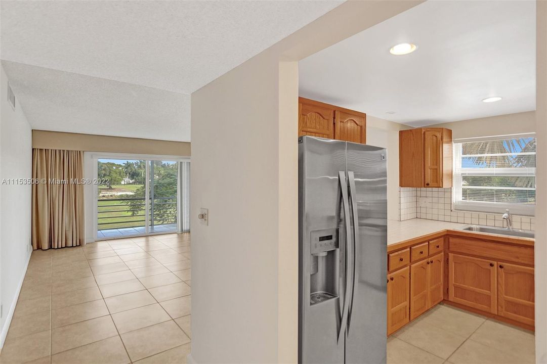 Kitchen to right, living room straight ahead