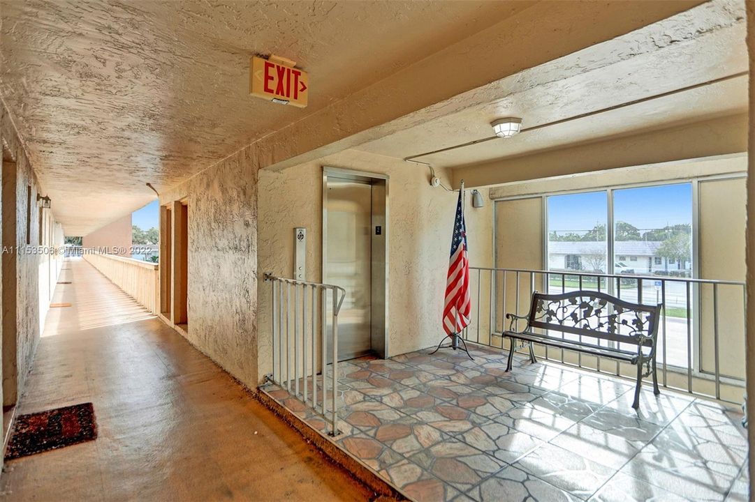 Elevator & catwalk to unit at end