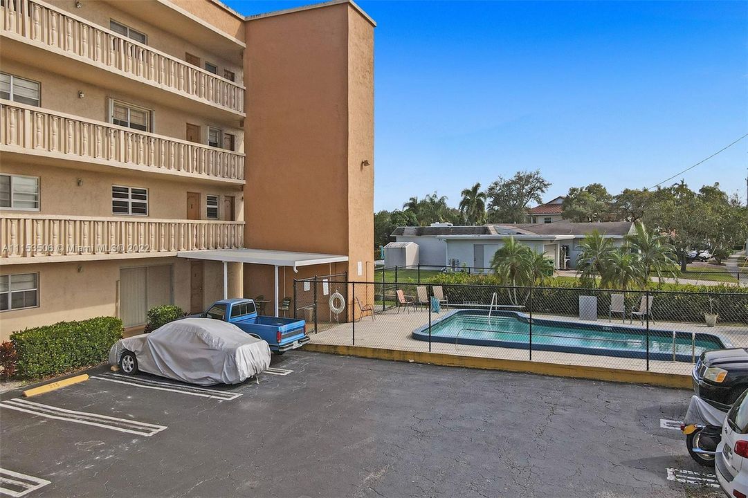 Your assigned parking space is to the left of the covered car right in front!!