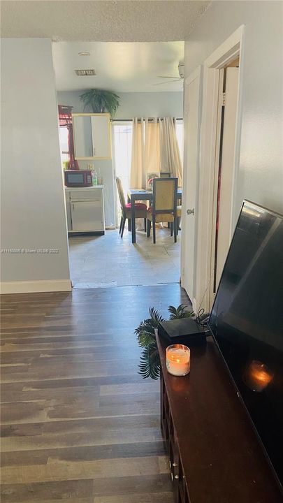 LIVING ROOM LOOKING INTO KITCHEN