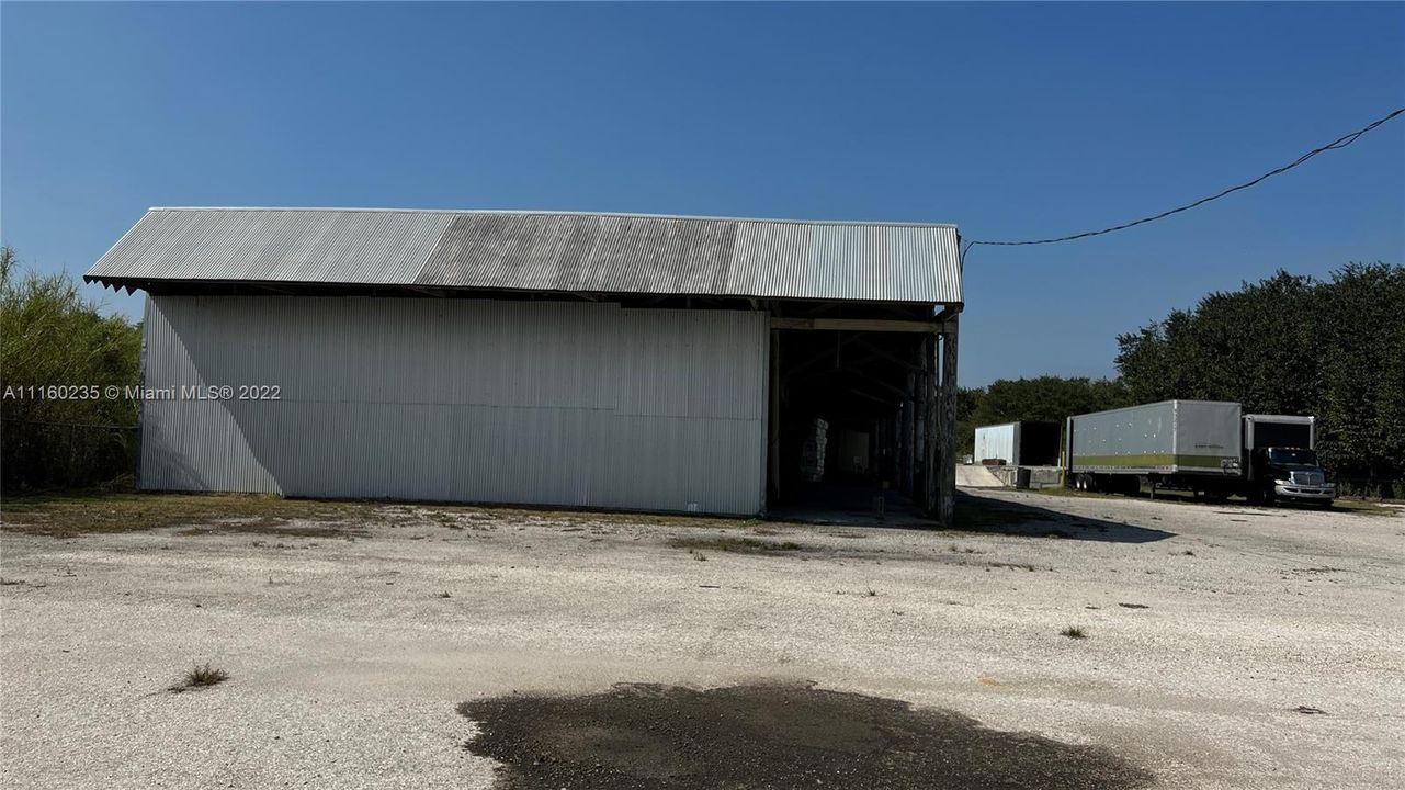 Front view of the Pole building and adjacent yard.