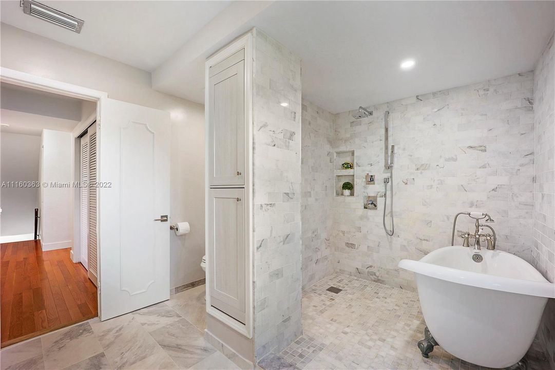 2nd bathroom with marble floor and walls