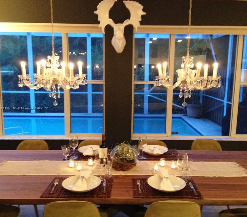 Dining room with pool and golf views.