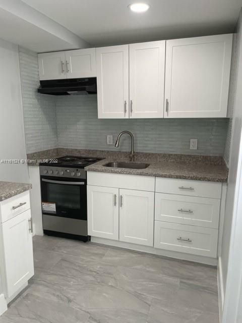 Kitchen with Brand New Electric Stove