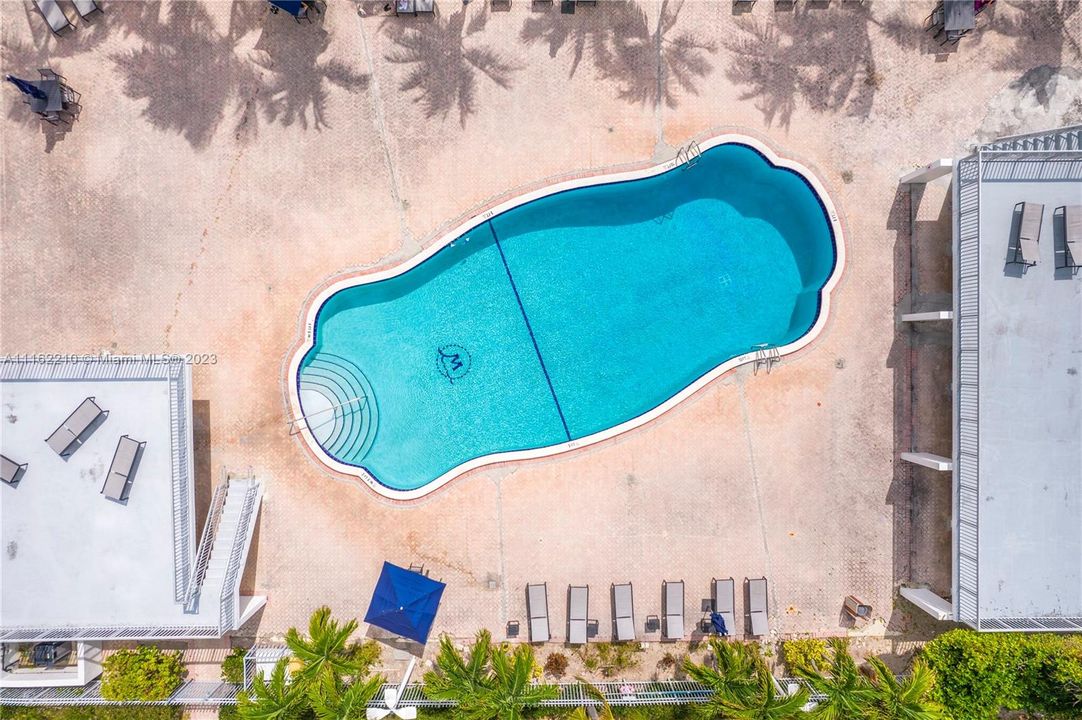 Swimming pool with beach side Cabana